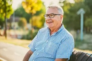 Shine-Memory-Care-man-sitting-on-bench